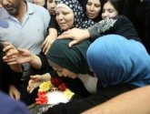 أمهات الشهداء يختطفن أبناءهن من ثلاجات الاحتلال