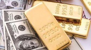 هبوط للذهب مع صعود الدولار الأميركي