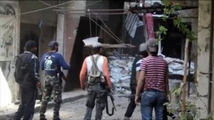 الجيش السوري وفصائل فلسطينية يواجهون &quot;داعش&quot; بمخيم اليرموك