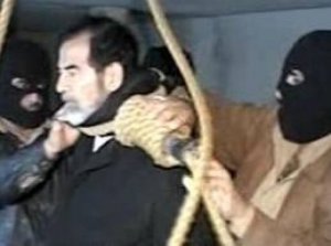 متى تم توقيع مذكرة إعدام صدام حسين؟
