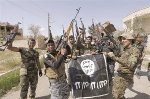 العراق يُسقط علم «داعش» في تكريت
